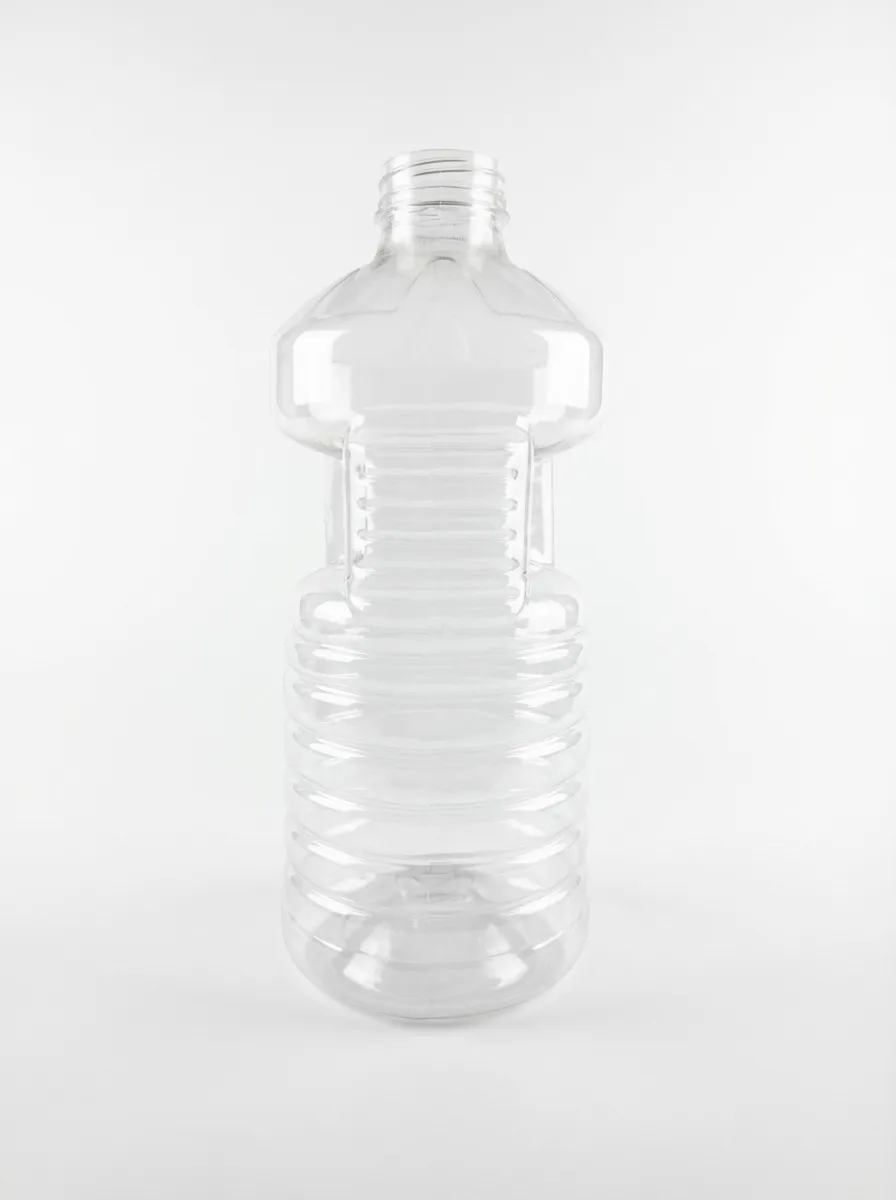 Clear PET bottle with wide ribbed body and grip waist